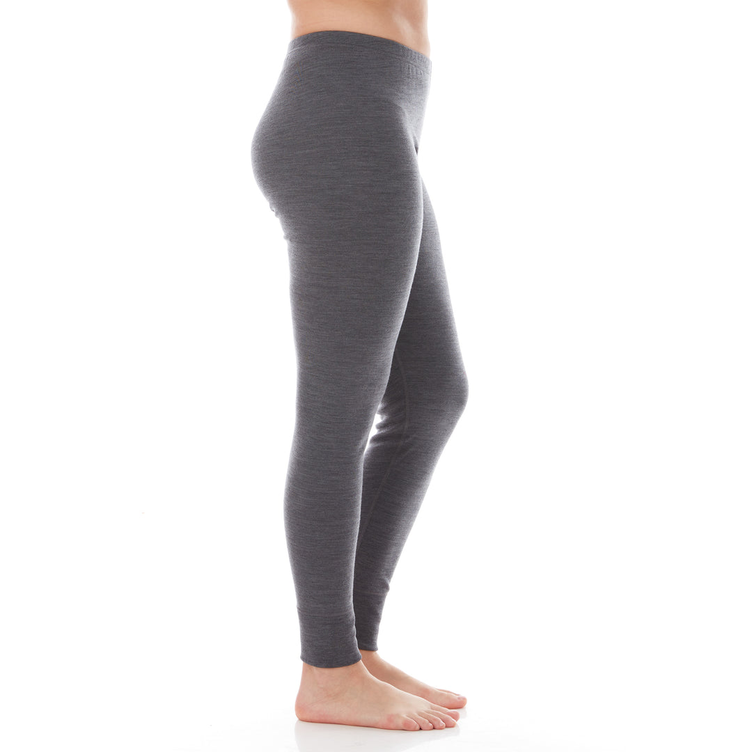 A pair of one hundred percent merino wool lightweight women's base layer bottoms. These bottoms feature a gusset between the legs for improved range of motion, and cuffs around the ankles for comfort and style. #color_charcoal-gray