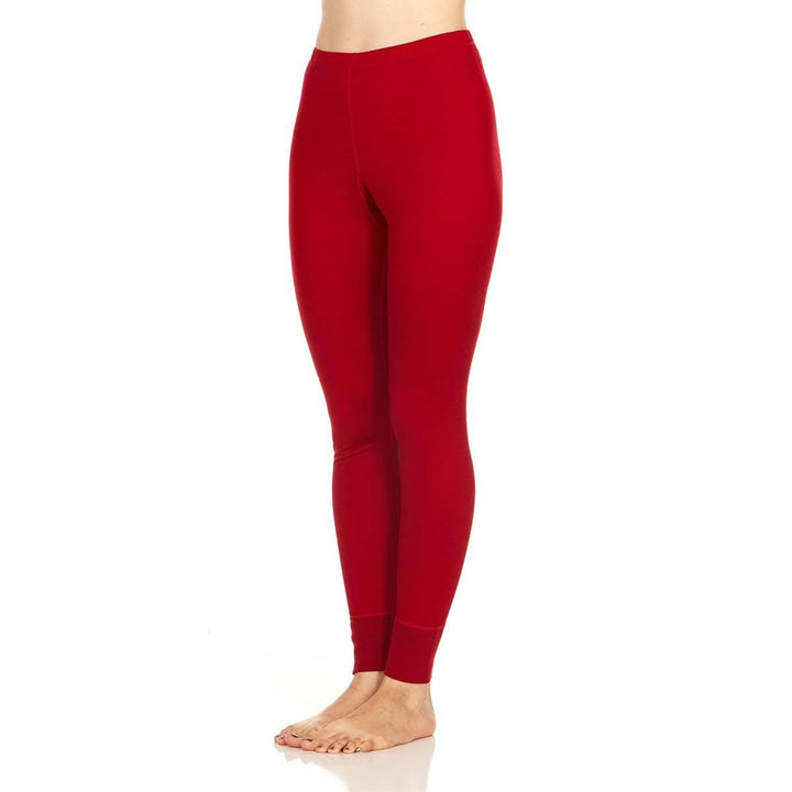 A pair of one hundred percent merino wool lightweight women's base layer bottoms. These bottoms feature a gusset between the legs for improved range of motion, and cuffs around the ankles for comfort and style. #color_true-red