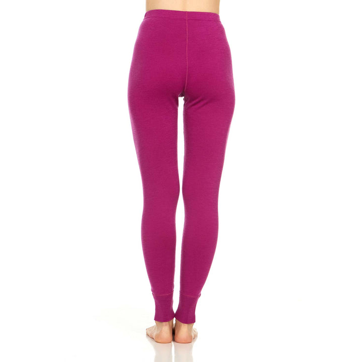 A pair of one hundred percent merino wool midweight women's base layer bottoms. These bottoms feature a gusset between the legs for improved range of motion, and cuffs around the ankles for comfort and style. #color_radiant-violet